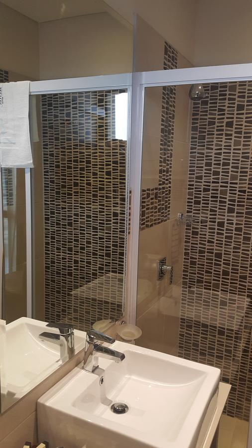 Hotel Selton 金沙萨 外观 照片